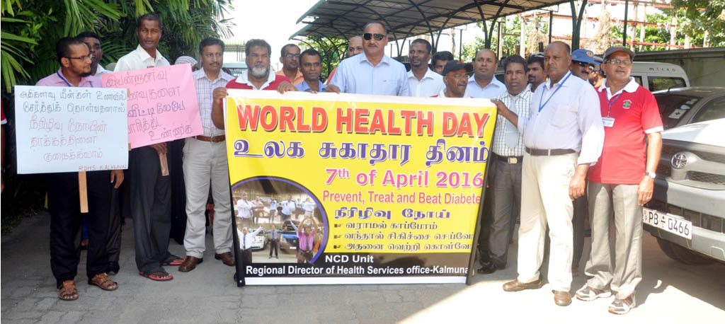 கல்முனையில் சுகாதார தின ஊர்வலம்; அமைச்சர் நசீர், துண்டுப் பிரசுரம் விநியோகித்தார்