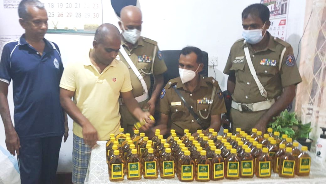 வீட்டில் விற்பனைக்காக மறைந்து வைக்கப்பட்டிருந்த மதுபான போத்தல்கள்: காரைதீவில் சிக்கின